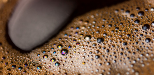 Close up of a coffee surface bubble.