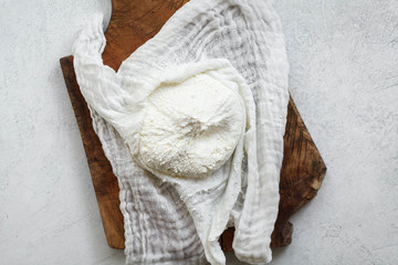 Raw Milk yogurt cheese ricotta in muslin cloth probiotic fermented food