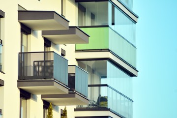 Modern apartment buildings on a sunny day with a blue sky. Facade of a modern apartment building