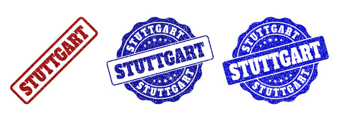 STUTTGART scratched stamp seals in red and blue colors. Vector STUTTGART labels with dirty surface. Graphic elements are rounded rectangles, rosettes, circles and text labels.