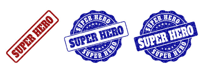 Obraz premium SUPER HERO grunge stamp seals in red and blue colors. Vector SUPER HERO watermarks with grunge effect. Graphic elements are rounded rectangles, rosettes, circles and text tags.