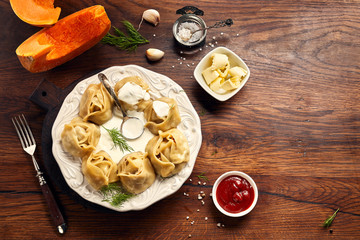 Asian steamed dumplings Manti with pumpkin and garlic.