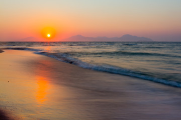 Obraz premium Sunset on a beach. Kos, Greece. motion.