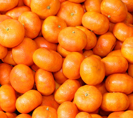 orange clementines for sale at the greengrocer