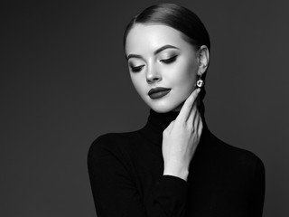 Beautiful Young Woman with Clean Fresh Skin. Perfect Makeup. Beauty Fashion. Cosmetic Eyeshadow....