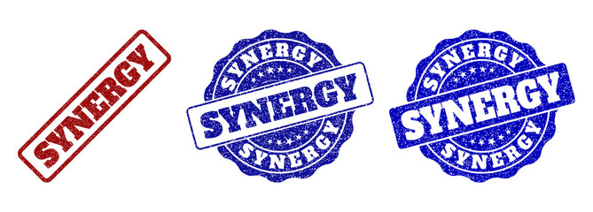 SYNERGY scratched stamp seals in red and blue colors. Vector SYNERGY labels with distress surface. Graphic elements are rounded rectangles, rosettes, circles and text labels.