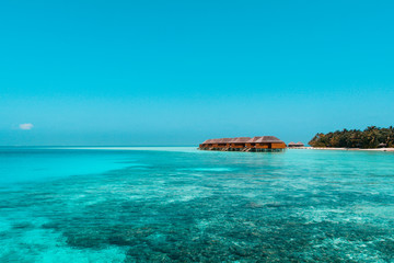 Fototapeta premium Beautiful beach with water bungalows or water villas at Maldives