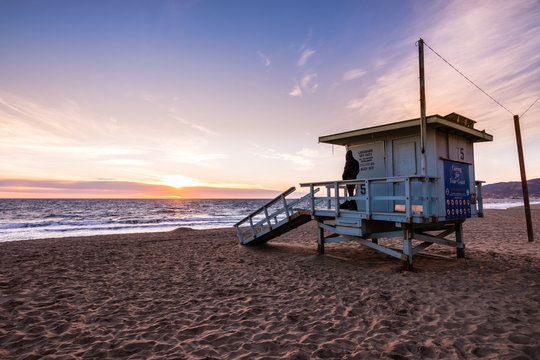 Lifeguard tower on one of the sandy Malibu beaches; beautiful sunset light; Pacific Ocean coastline, California © Sundry Photography