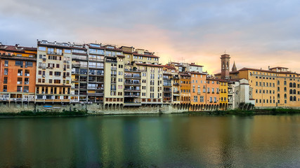 Fototapeta na wymiar Embankment of Arno river in Florence, Italy.