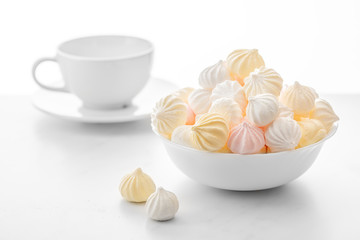 sweet marshmallows in a cup, delicious dessert, on a white background