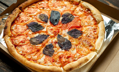 pizza on a wooden table