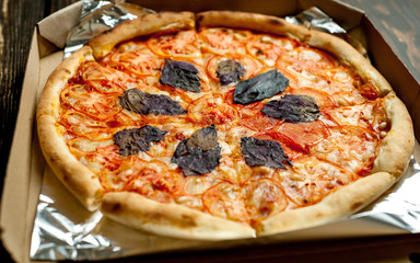 pizza on a wooden table