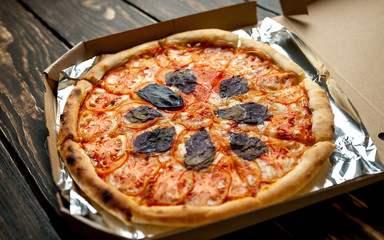 pizza on a wooden table