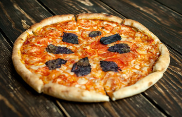 pizza on a wooden table