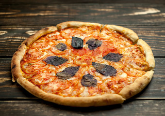 pizza on a wooden table