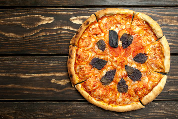 pizza on a wooden table