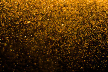 gold glitter defocus background for, cerebrating, christmas, newyear, event purpose with copyspace
