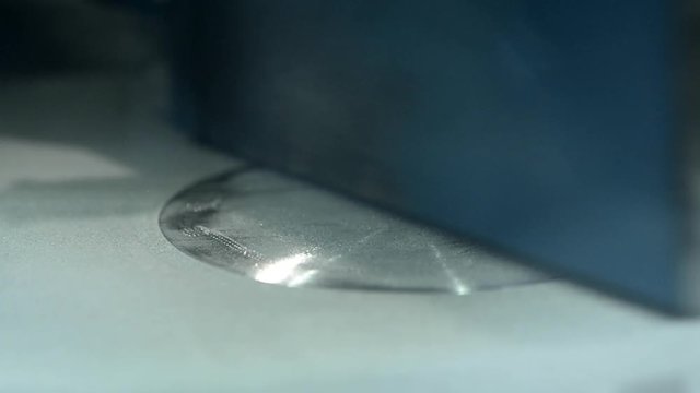 Timelapse, fast video. 3D printer printing metal. Laser sintering machine for metal. Metal is sintered under action of laser into desired shape. Progressive modern DMLS, SLM, SLS additive technology