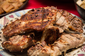 delicious grilled meat steaks on plate table