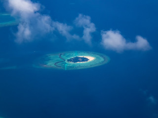 Naklejka na ściany i meble The tiny islands of the Maldives from the air