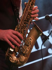 jazz day festival. Saxophone, music instrument played by saxophonist player musician