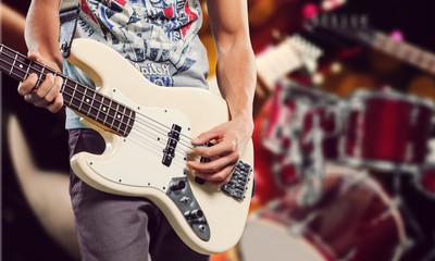 Naklejka premium Young man play guitar