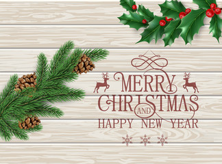 Merry Christmas and Happy New Year greeting card with green fir branch and holly berries on wooden background.