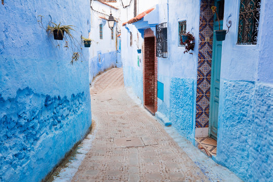 narrow street in blue city Chefchaouen in Morocco