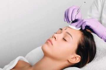 Beautiful woman having mechanical facial cleansing, remove blackhead