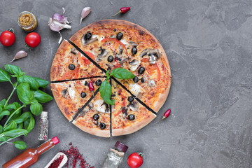 Pizza, food, vegetable, mushrooms.  Vegetables, mushrooms and tomatoes pizza on a black wooden background. It can be used as a background