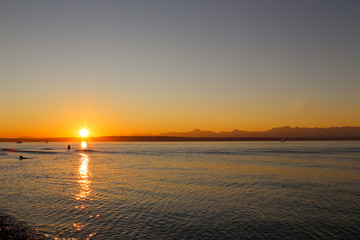 Beach sunset at Golden Gardens Park, Seattle Washington 