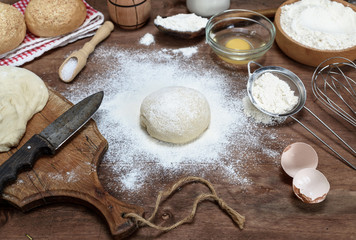 white wheat flour round dough and ingredients