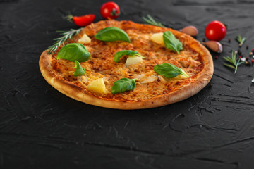 pizza, pineapple, chicken, tomato sauce, cheese, basil (pizza ingredients). Hawaiian pizza. Top view. copy space