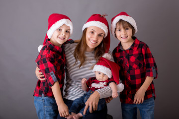 Family christmas portrait, isolated on gray, studio image
