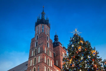 Fototapeta na wymiar Christmas market in Krakow city on evening