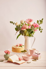 Obraz na płótnie Canvas naked cake with roses on white background