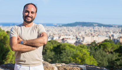 Man with a beard smiling in Barcelona