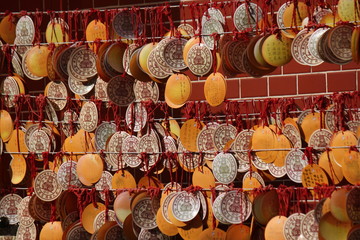 Wishing cards hanging on a line in a buddhist temple in Taiwan, China, Asia 