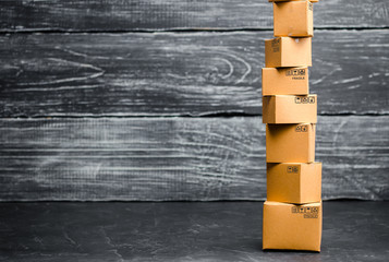 A tower of cardboard boxe. The concept of online sales, shopping and online shopping. Realization...