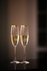 A pair of glasses of champagne in the interior