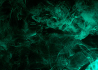 colorful aquamarine smoke isolated on black background