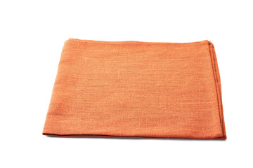Orange folded textile napkin on white background