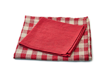 Red and red-checkered textile napkins on white background