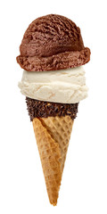 Vanilla and chocolate Ice cream scoops with sprinkles in cone isolated on white background
