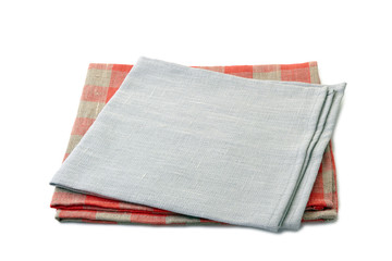 Folded gray and red-checkered textile napkins stacked on white