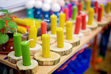 Christmas candles made from bee wasp handmade by school children