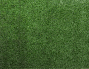 Artificial grass carpet as background, top view. Exterior element