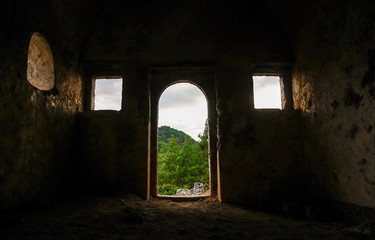 Detail of Kayakoy Chapel from inside in historcial Lycian village of Kayakoy, Fethiye, Mugla, Turkey. Ghost Town Kayaköy, anciently known as Lebessos and Lebessus. 3000 Greek life in the 19th century.