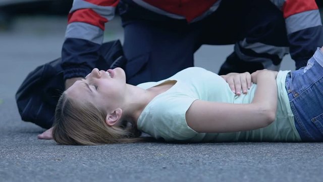 Lady suffering from terrible pain in abdomen hemorrhages due to trauma first aid
