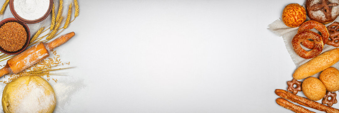Fresh bakery products and ingredients for his cooking, banner with space for text, top view